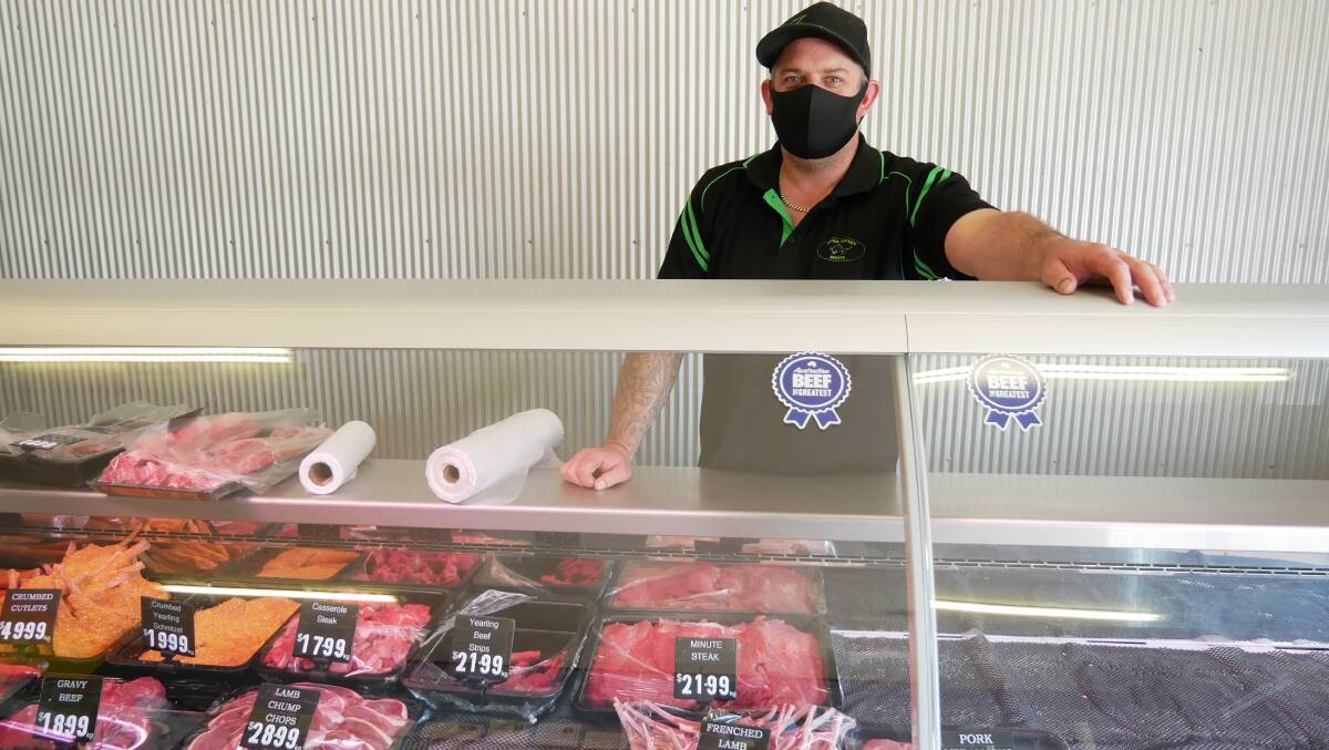 Owner Allan Miles from Bega Valley Meats stands behind the counter. Photo: Ellouise Bailey 
