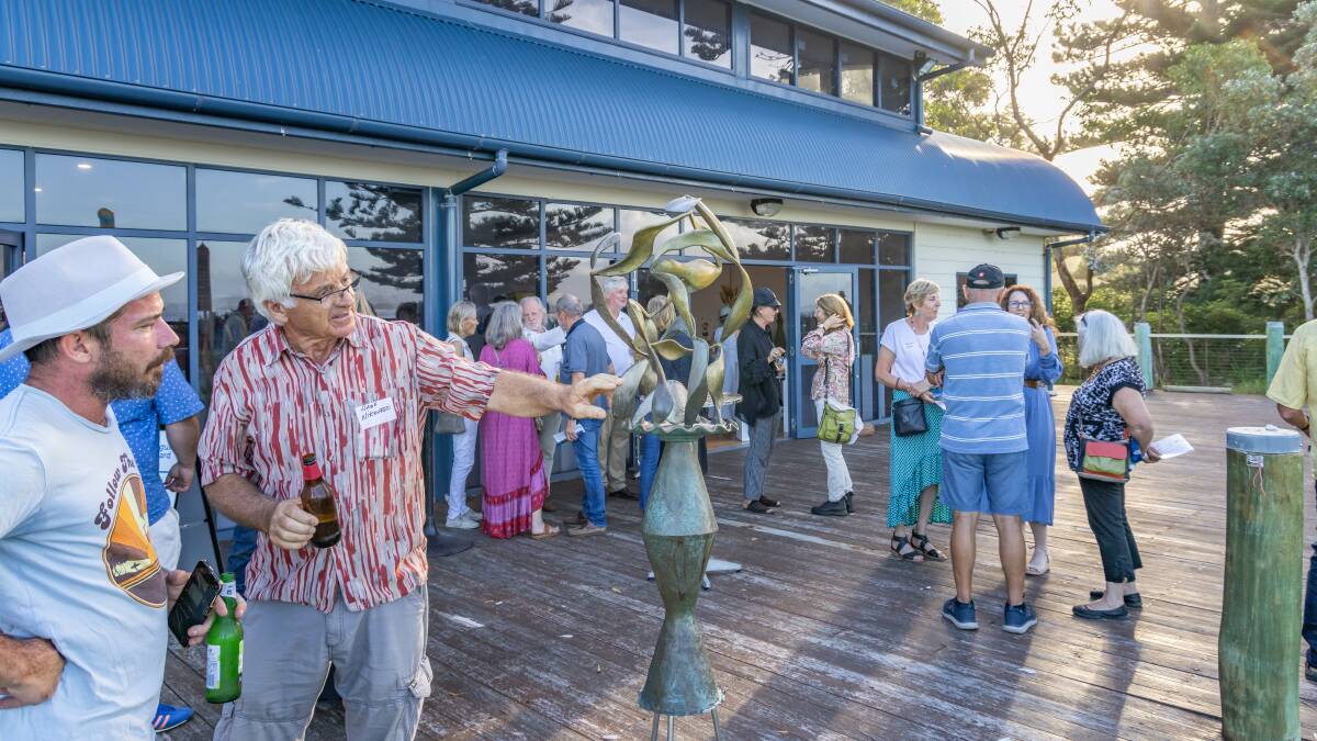 Patrons and guests enjoying the atmosphere of Sculpture Bermagui on Friday evening, March 4, 2022. Photo: David Rogers 