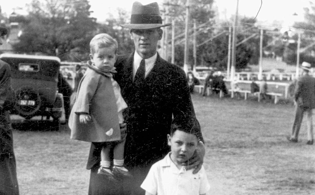 A man and his two children at the scaled-down Bega Show of 1942. Photo: supplied