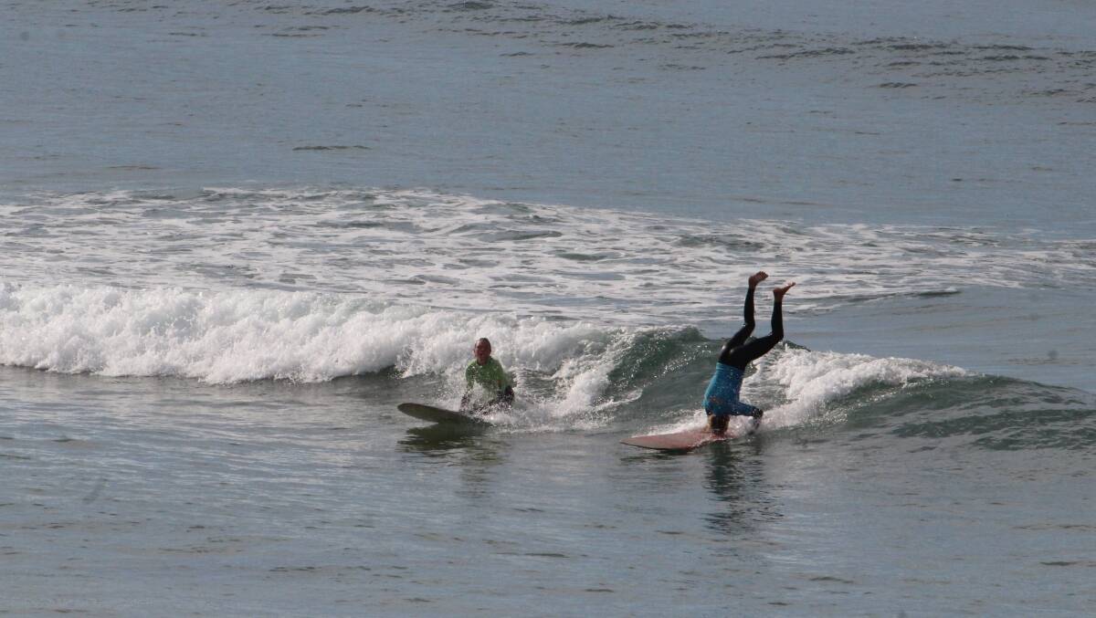 Some headstands were already put on show in the first round of the Malibu contest. Photo: Ellouise Bailey