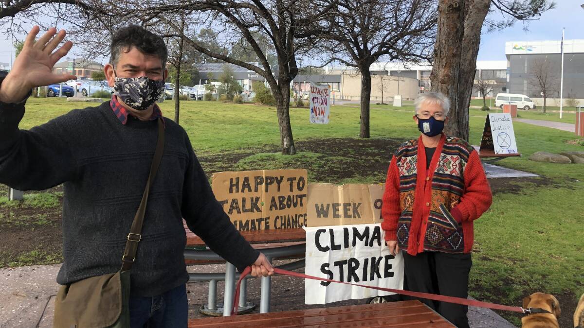 Fellow activist Alistar Doole joins Vivian Harris in the park for a chat at her 99th climate strike last Friday, July 2. Photo: supplied 