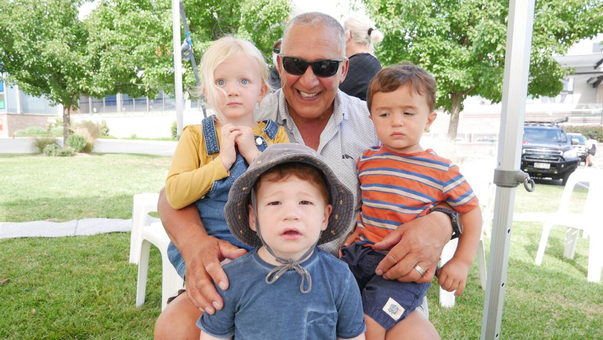 Rhys Tamatea with his grandchildren at the citizenship ceremony on Australia Day in Littleton Gardens, Bega. Photo: Ellouise Bailey 
