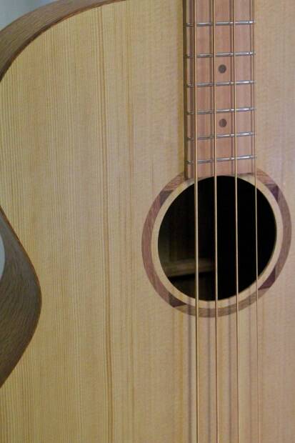 A close up of the sound hole and strings of the bass guitar. Picture supplied 
