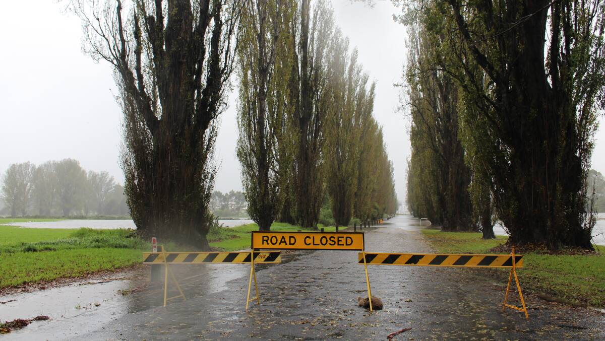 A photo collection of roads closed and water rising around Bega Valley Shire