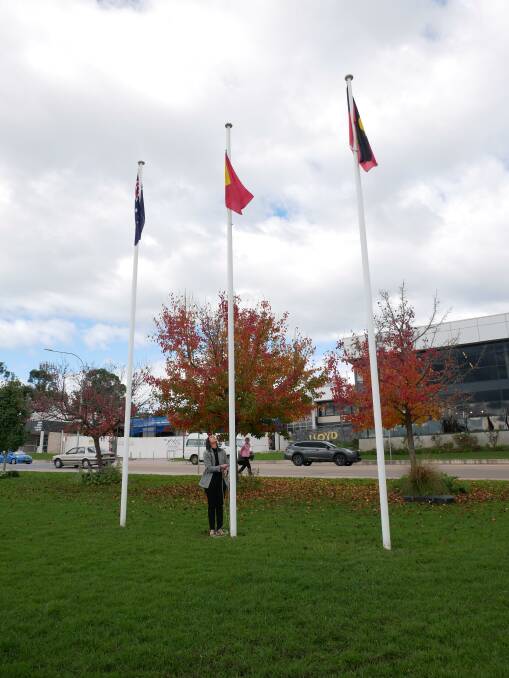 The Timor-Leste flag was raised in Littleton Gardens to mark 20 years since the neighbouring country gained independence. Photo: Ellouise Bailey