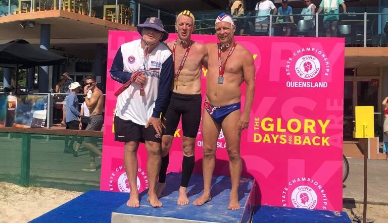 Matt Sierp (middle) and his fellow teammates at Surf Life Saving state championships in Burleigh Heads on the Gold Coast. Photo: supplied 