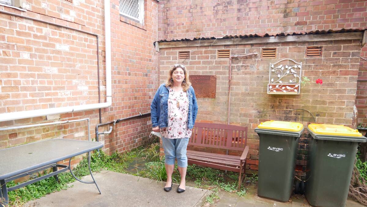 Cheryl Robinson has a background in community services and education support. Here she stands out on the back patio of her new shop where she intends to run exercise sessions with her clients or even basic cooking workshops. 