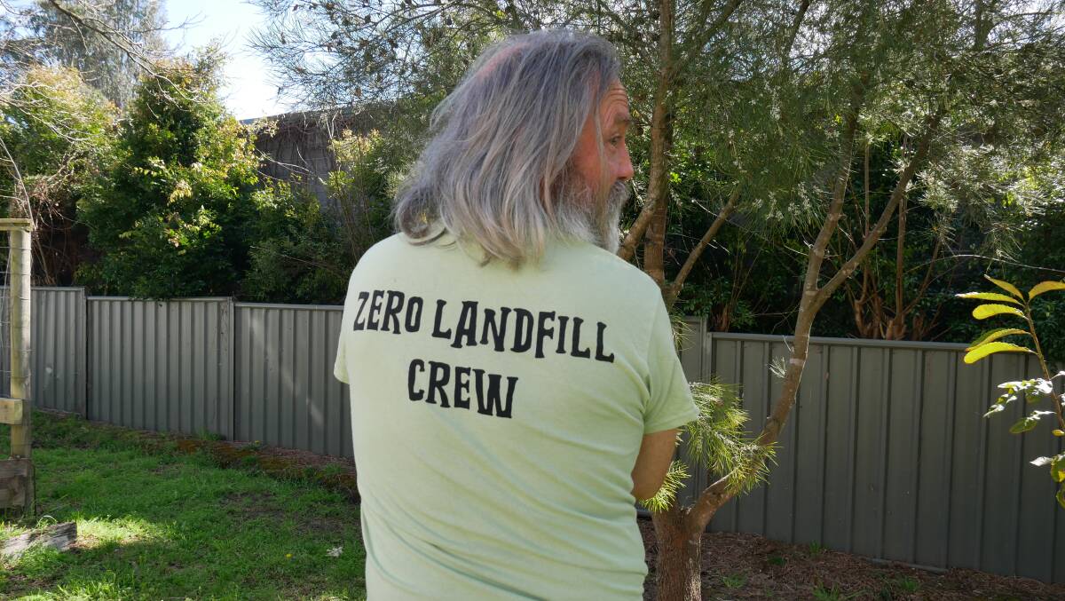 Hugh wears a crew member shirt he wore as the lead of the Cobargo Folk Festival sustainability/recycling team. He worked with a dedicated team of 15 volunteers. Picture by Ellouise Bailey 