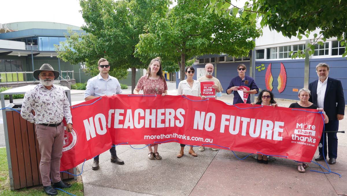 President of the NSW Teachers Federation Angelo Gavrielatos (far right), with NSW Teachers Federation Country Organiser for the Queanbeyan office Waine Donovan (far left) and some of their members of the Bega electorate during a meeting ahead of the by-election in February. Photo: Ellouise Bailey 