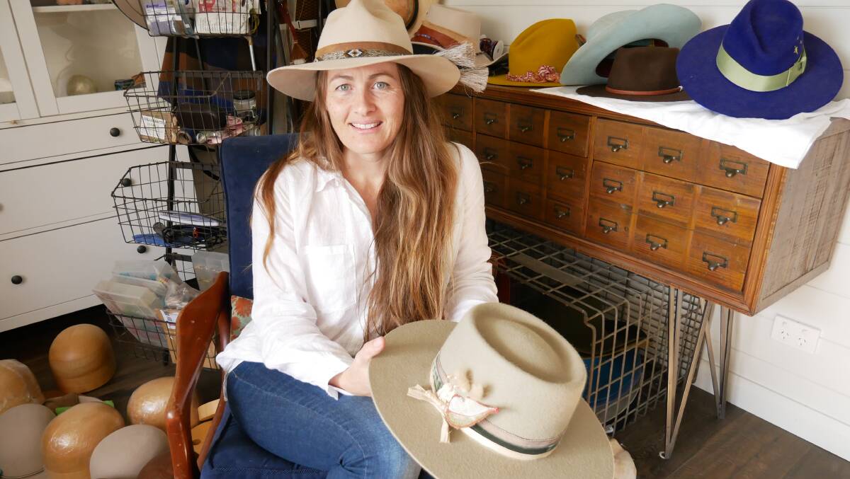 Shona Fox (Telfer) is the owner of a custom hat making business called Honey Fox Hats. Here she sits in her home studio from Kameruka. Photo: Ellouise Bailey 