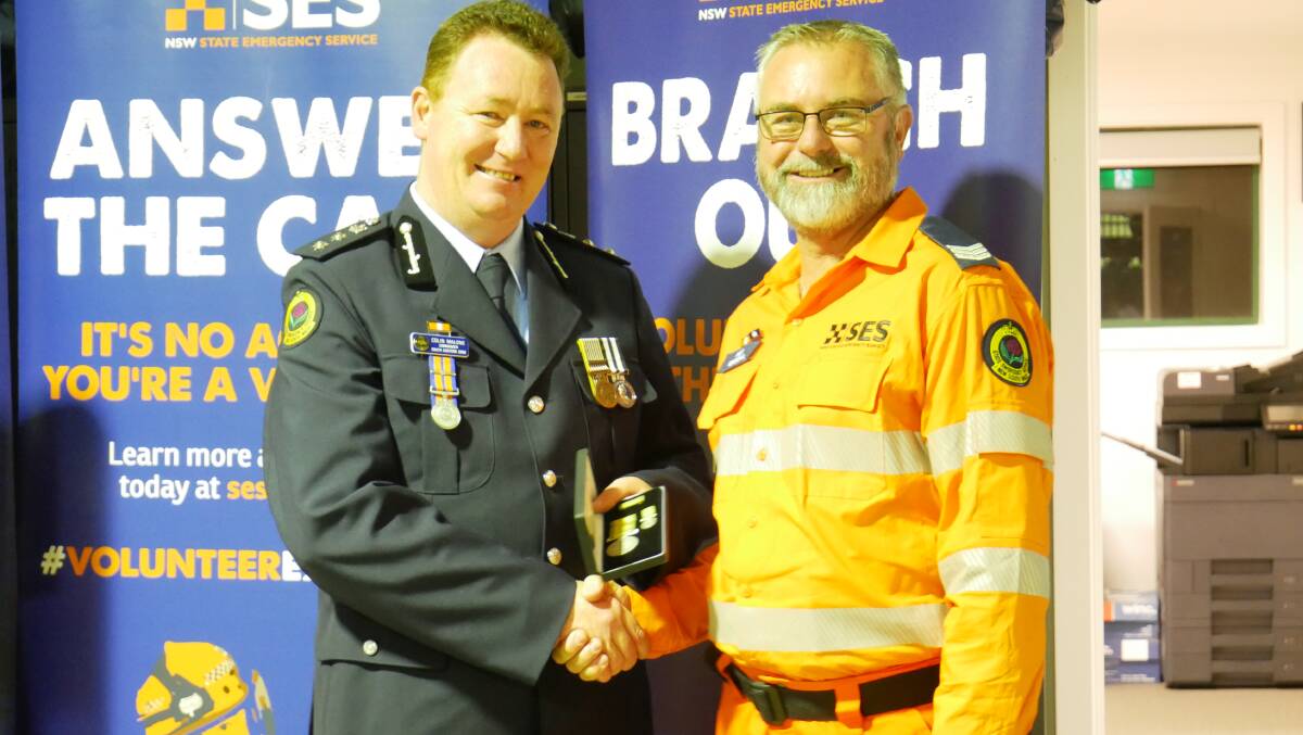 South Eastern zone commander Colin Malone and award recipient Rodney Gould. Photo: Ellouise Bailey 