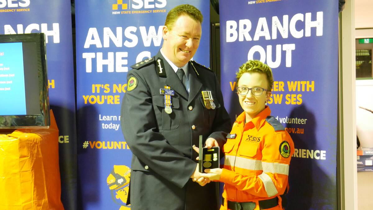 South Eastern zone commander Colin Malone and award recipient Jennifer Walker. Photo: Ellouise Bailey 