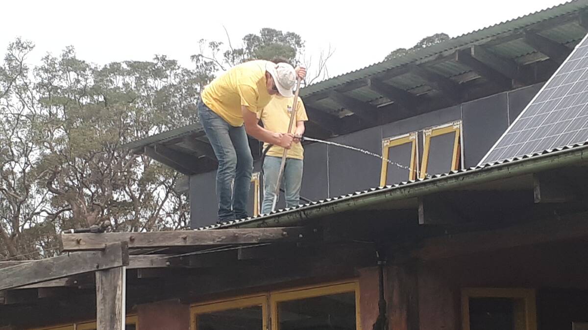 The community hall at The Crossing being cleaned to remain vigilant for fire preparedness in January earlier this year. Photo: supplied 