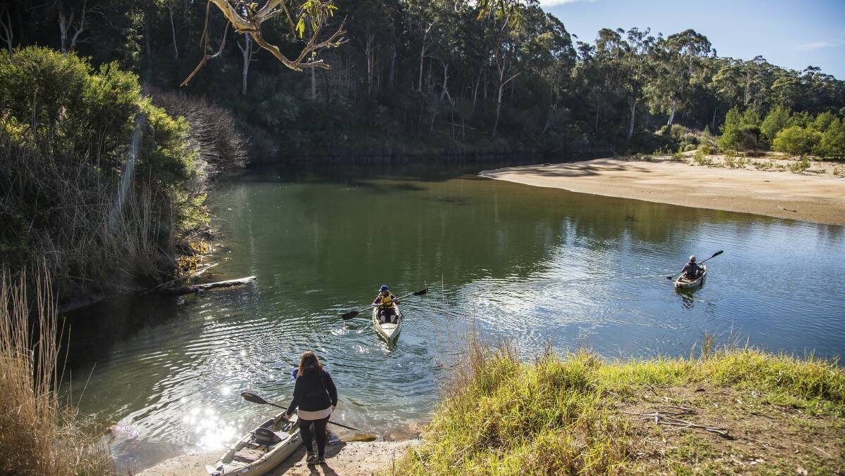 Visitors heading out for a guided kayak tour on the Towamba River with Kiah Wilderness Tours, Kiah. Picture: Destination NSW 