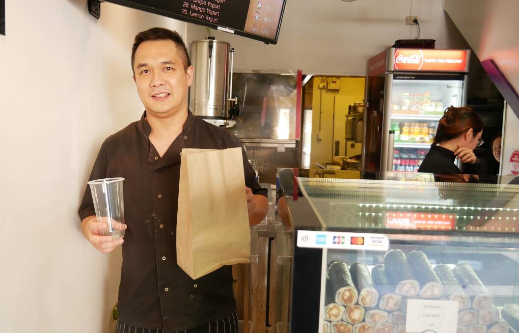Wok N Roll owner Calvin Vong said while he understood the introduction of the ban on single-use plastics, the higher costs of more sustainable options would mean price hikes for his products. Photo: Ellouise Bailey 