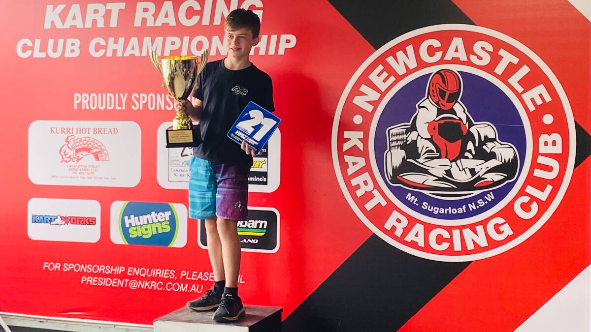 Aidan Williams on the winners podium after being awarded NSW State Champion and the prestigious blue plate for Ka4 Jnr light. Picture: supplied. 