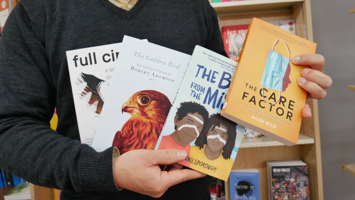 From left: Full Circle: Power, Hope and the Return of Nature by Scott Ludlam, The Golden Bird: New and selected poems by Robert Adamson, The Boy from the Mish
by Gary Lonesborough and The Care Factor: A Pandemic Nurse's Story by Ailsa Wild. Photo: Ellouise Bailey