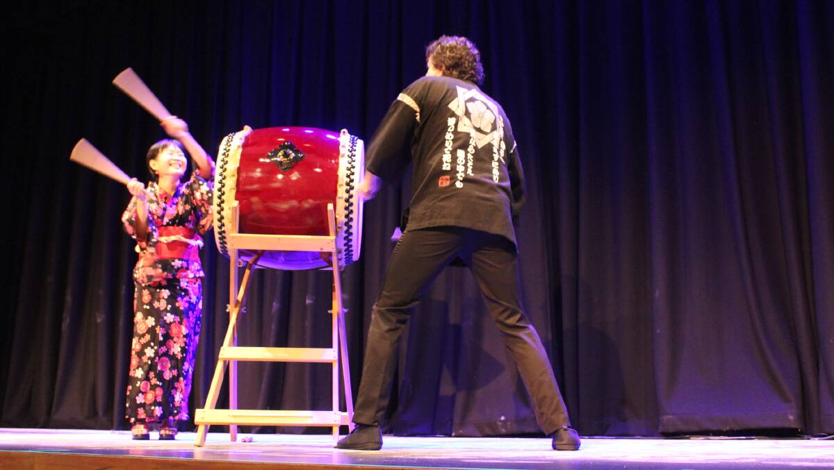 Reiko on stage performing Taiko drumming at the Bega Valley Harmony Day event earlier this year. 