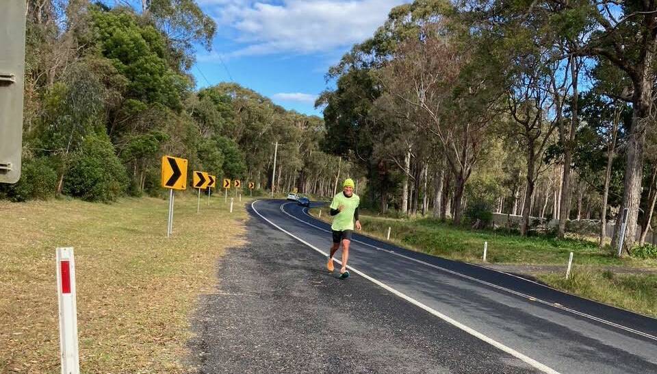 Dane Waites is regularly seen running along the roads of the Bega Valley. Locals like to acknowledge him with a honk of their horn, to which he usually responds by smiling and waving. Photo: supplied 