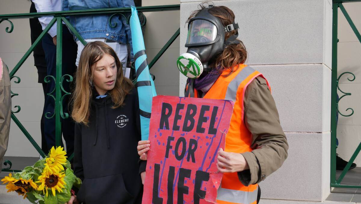 Extinction Rebellion protesters and supporters came to Bega Courthouse around 9.30am to support the activists who had been charged following a protest held at Bega MP Andrew Constance's office on Tuesday, June 8. Photos: Ellouise Bailey