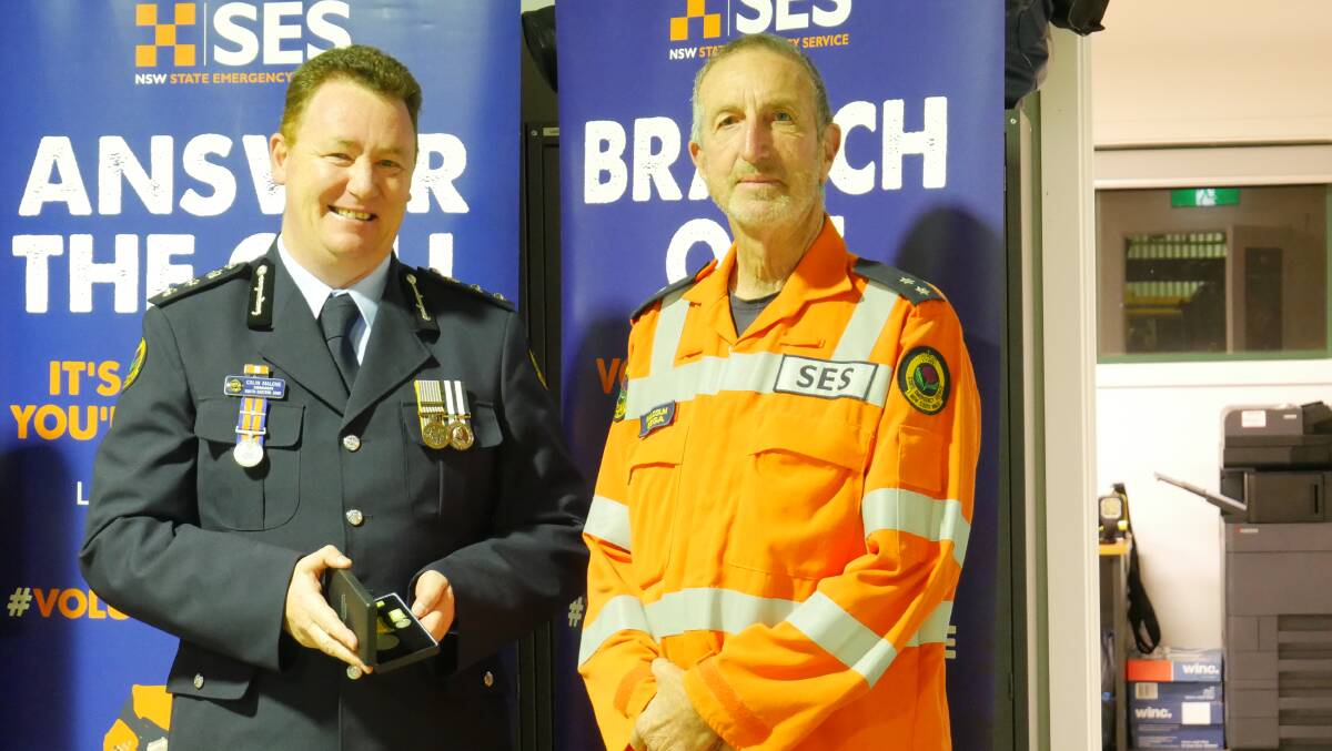 South Eastern zone commander Colin Malone and award recipient Malcom Douglas. Photo: Ellouise Bailey