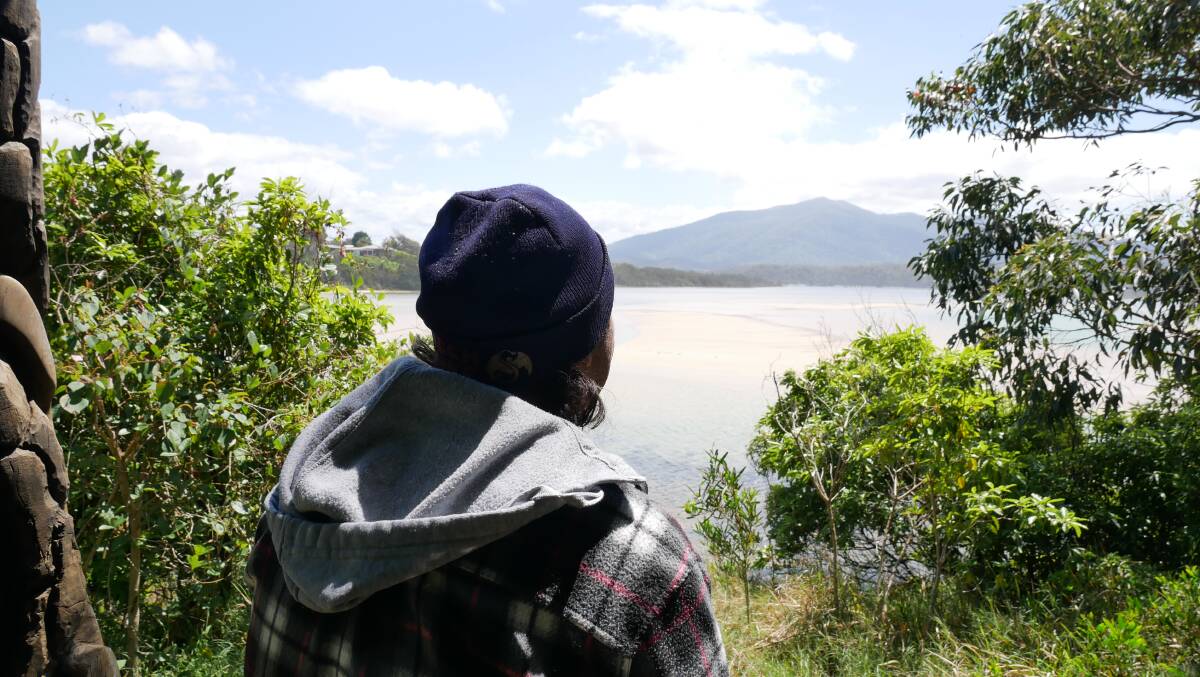 Mr Foster looks out towards Gulaga located immediately west of Tilba Tilba. It is the place of ancestral origin for Yuin people and symbolises the mother. Photo: Ellouise Bailey