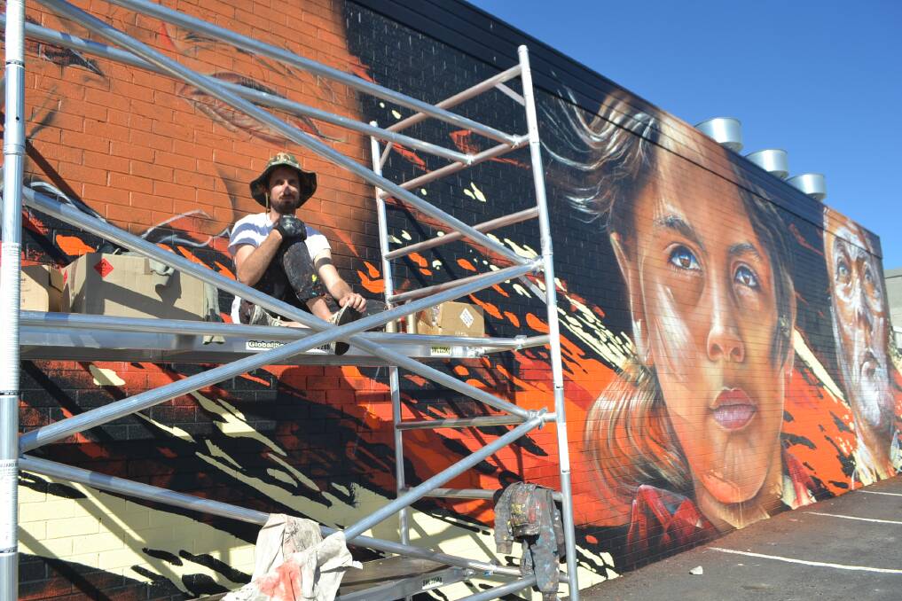 Matt Adnate was invited to paint the mural. Photo: Maeve Bannister