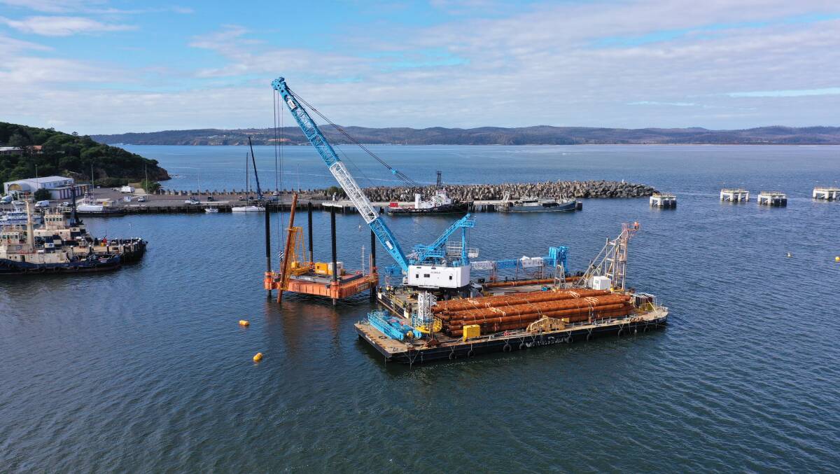 Barges in the harbour mark official start on Eden's wave attenuator
