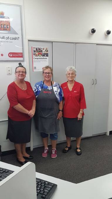 Narooma Post Office employees Leanne Turnbull and Janette Hunt with Monty's Place Treasurer Suzie Egan.
