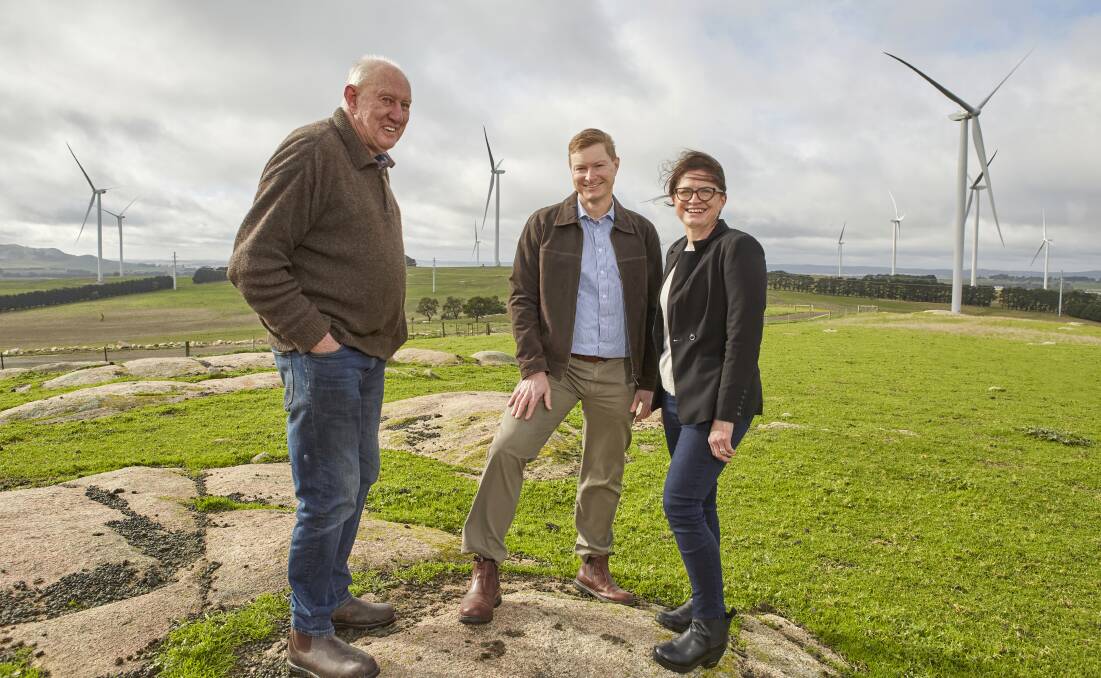 NO REGRETS: Host farmer Alan Pitcher with Nevetts Lawyers' Kent Mallinson and Cathy Drake at his Skipton property, which hosts turbines as close as 500 metres to his home.