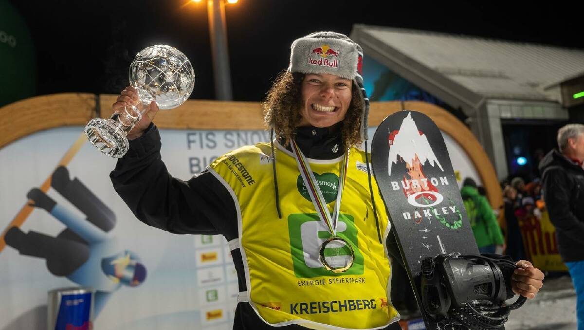 Dalmeny's Valentino Guseli with the crystal globe. Picture by FIS Snowboarding.