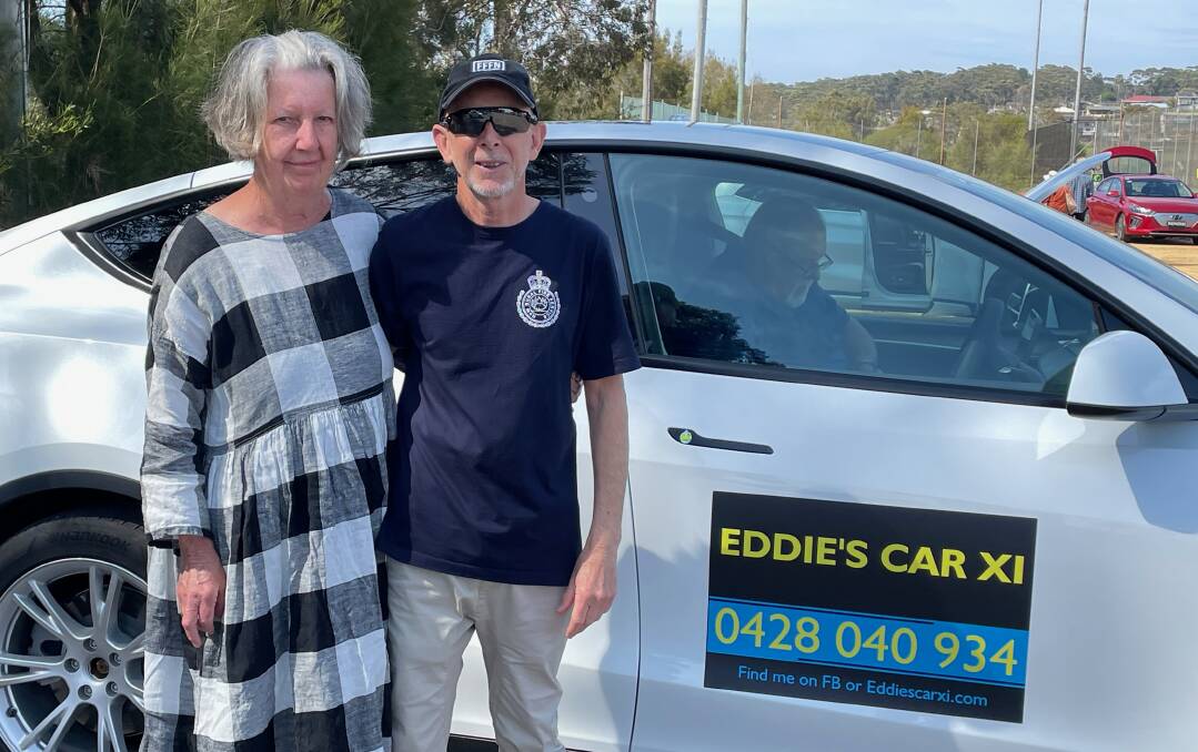 Penelope Gaha (pictured with husband Lewis Gaha) enjoyed her test drive of a Tesla at the Renewable Cobargo EV Show and Tell at Bermagui Country Club on Saturday, October 21. Picture by Marion Williams