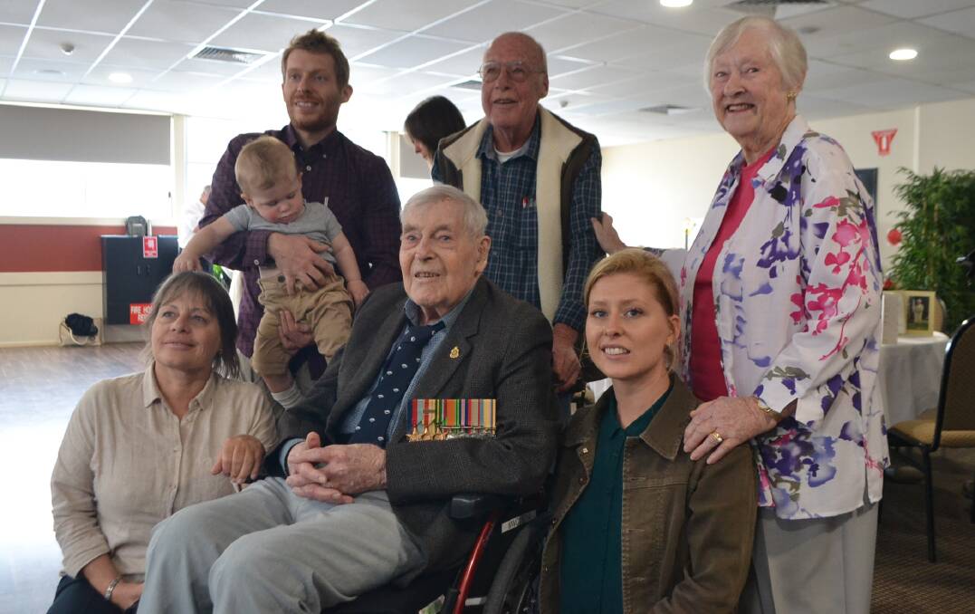 Allan Forster with members of his family at his 100th birthday in December 2019. File picture