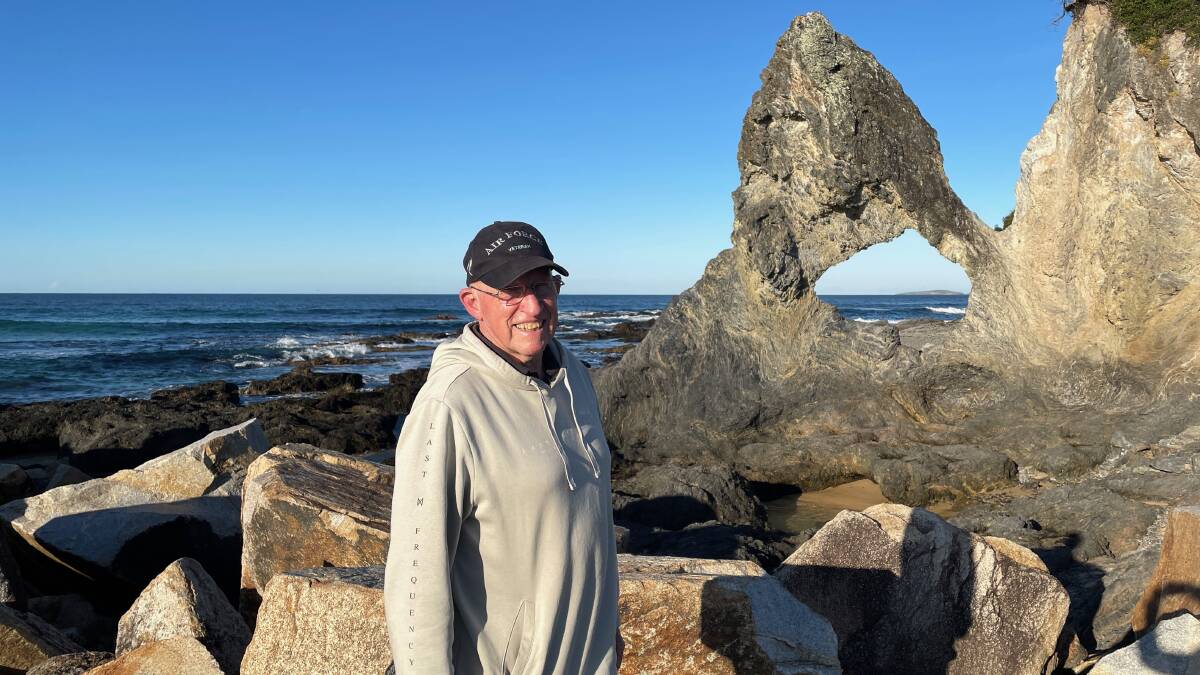 Narooma born and bred Jon King fears that it will not be long before Narooma's iconic tourist attraction Australia Rock is lost. The right hand side join with the cliff face has narrowed considerably over the last 80 years Picture by Marion Williams