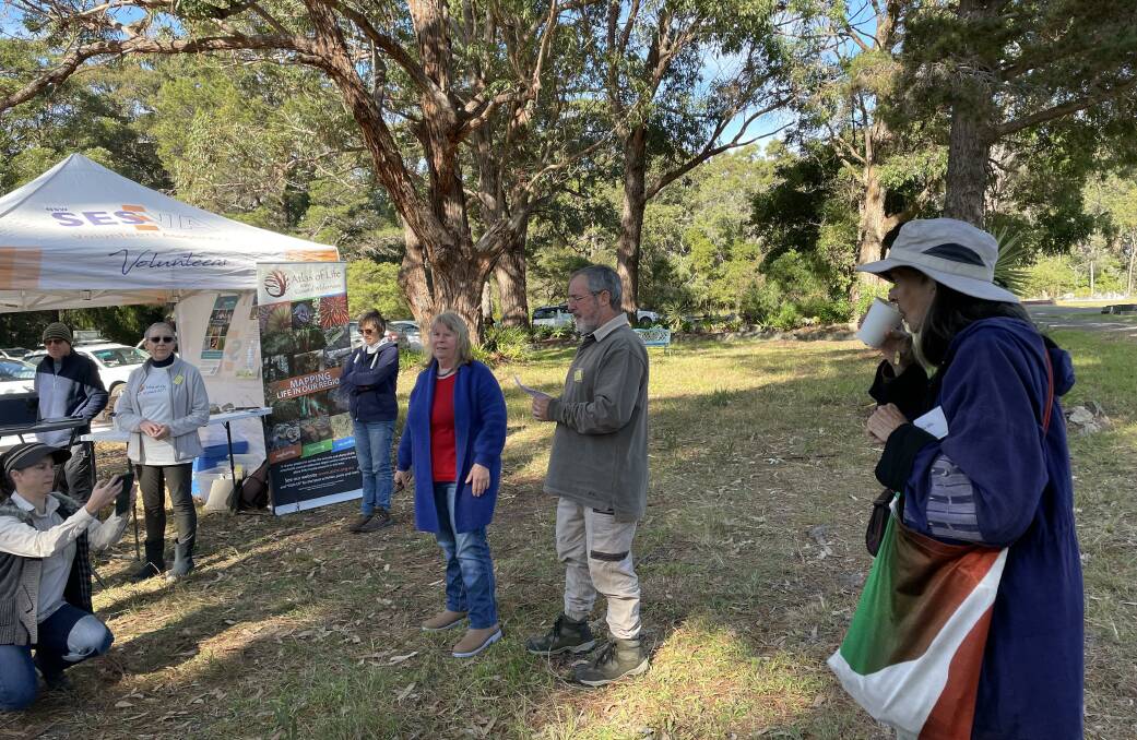 Raymond Daly, secretary of Atlas of Life, introduces Dr Fiona Firth and Jackie Miles at the Life in our Cemeteries event at Bermagui cemetery on Saturday July 9