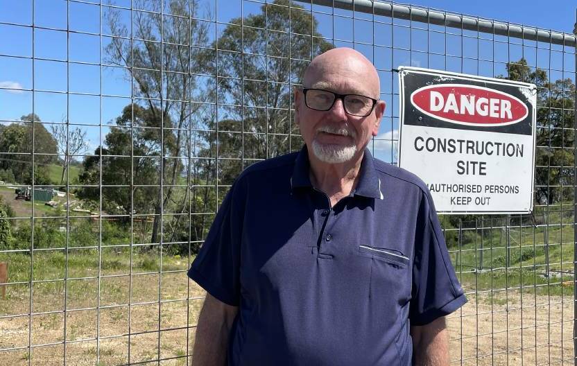 John Walters, chair of Cobargo Community Development Corporation, is delighted that the three Cobargo CBD rebuild projects are a step closer as they will be instrumental in securing the future economic strength and resilience that Cobargo deserves. Picture by Marion Williams