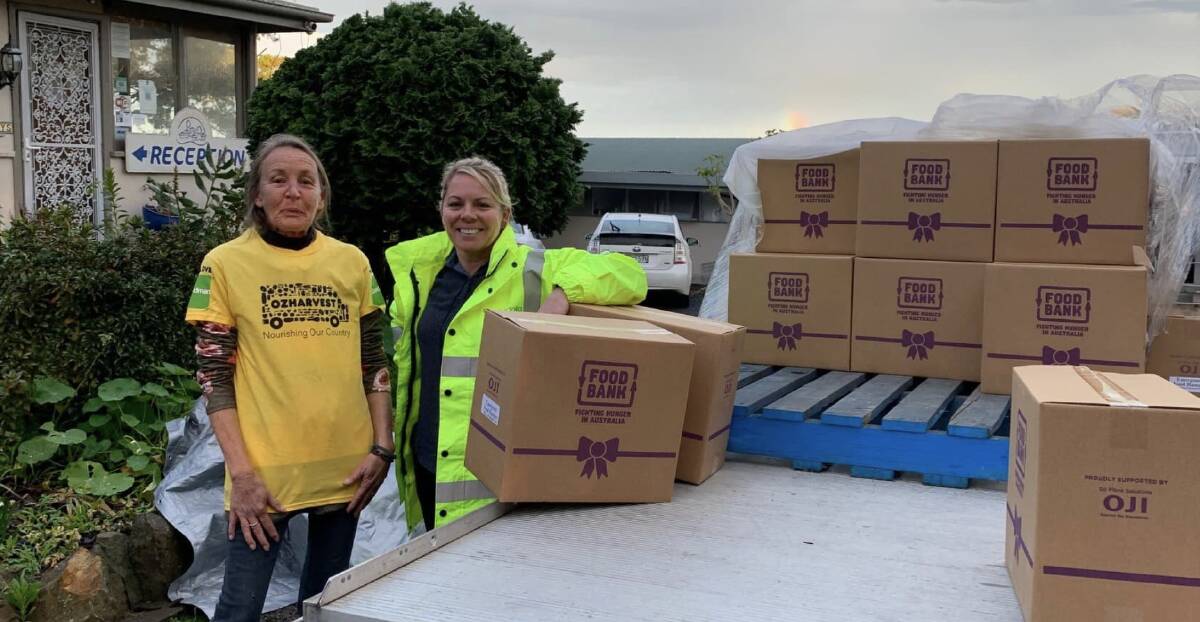 Michelle Preston (left) said a sweet collaboration with Lin Wilton, community recovery officer at Eurobodalla Shire Council, resulted in a donation of pantry boxes from Foodbank. Photo: OzHarvest Facebook
