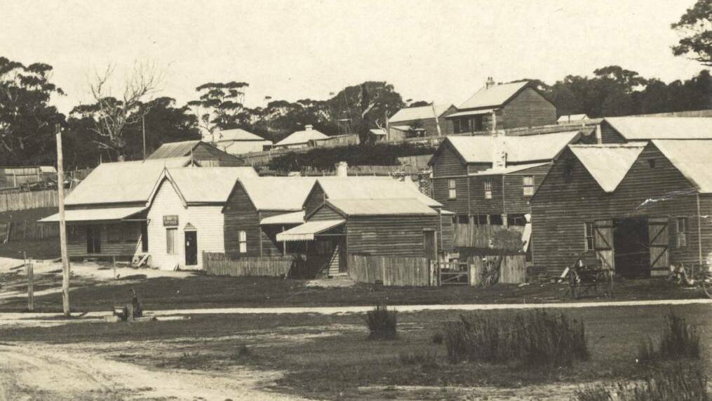 From left 30 Lamont Street (now Strangers in Paradise), 32 Lamont Street (rebuilt and now Bazza's Bakery), 34 Lamont Street and Sam Sinclair's blacksmith. Circa 1920. Image courtesy of Bermagui Historical Society