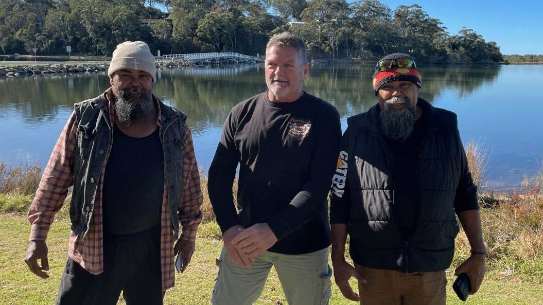 Gordon Patterson, president of Bermagui Chamber of Commerce (centre) and Gary Campbell, a board member of Merrimans Local Aboriginal Land Council (right) would like a new bridge to be built over Wallaga Lake. Pictured here with Paul Campbell (left). Picture by Marion Williams.