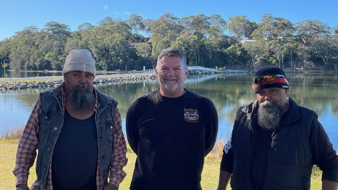 Some members of the community would like a new bridge to be built and the causeway removed. From left to right: Paul Campbell, Gordon Patterson, president of the Bermagui Area Chamber of Commerce and Tourism, and Gary Campbell, a board member of the Merrimans Local Aboriginal Land Council. Picture by Marion Williams