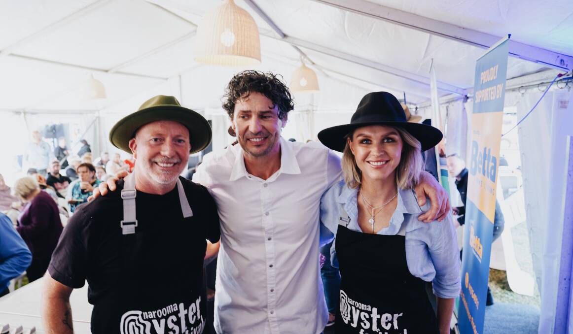 Never too many chefs in the kitchen. James White of Olssons Salt, chef Colin Fassnidge and cooking show host Courtney Roulston at the Narooma Oyster Festival 2022. Picture by Rob Locke