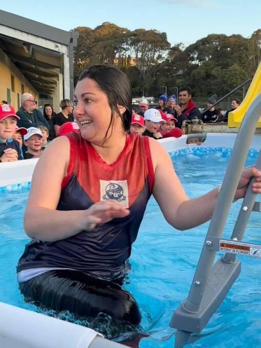 Eden-Monaro MP Kristy McBain was one of the local identities to go down the Ice Slide on Saturday, July 30 Photo: Narooma Lions Facebook