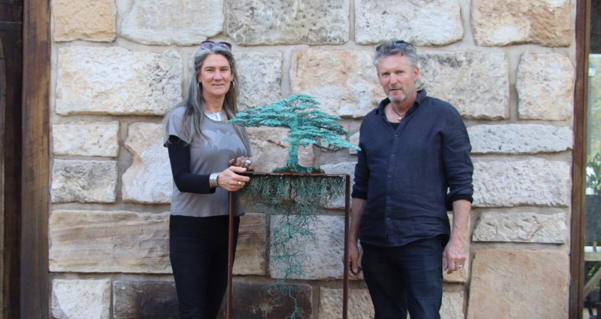 Rachel Burns and Ulan Murray with one of their sculptures. They will exhibit one of their latest works at Sculpture Bermagui March 9-17. Picture by Nick Glover