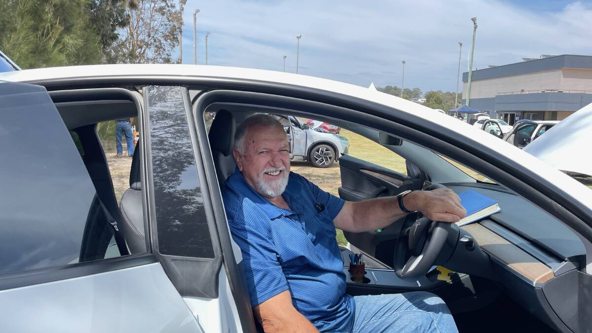 Eddie Holub had a three-month wait to get his Tesla Model Y. The Coolagolite resident was one of around 10 local EV owners at Renewable Cobargo's EV Show & Tell speaking with prospective EV owners and letting them go for a test drive. Picture by Marion Williams