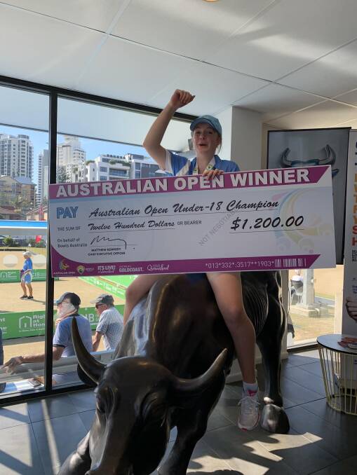Reese celebrating her win. Picture via Merimbula Dolphins Facebook Page. 