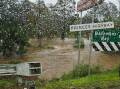 Mogo Creek rose quickly overnight in Mogo, destroying a section of Veitch Street and blocking access for some residents. Picture supplied