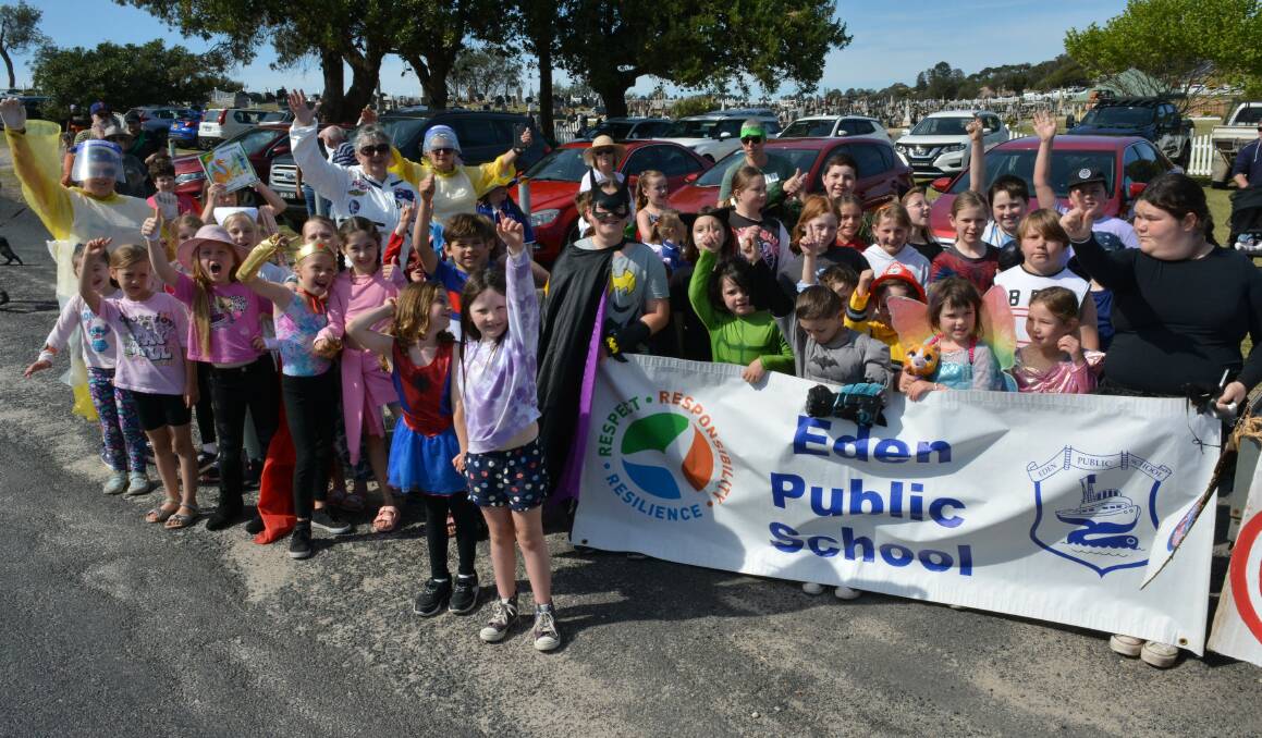Eden Public School's superheroes join the street parade. Picture by Ben Smyth
