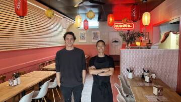 Co-owner Jamie Sverdrupsen alongside head chef Kaoru Ito within Merimbula's Umi-Ko Izakaya. Picture by James Parker