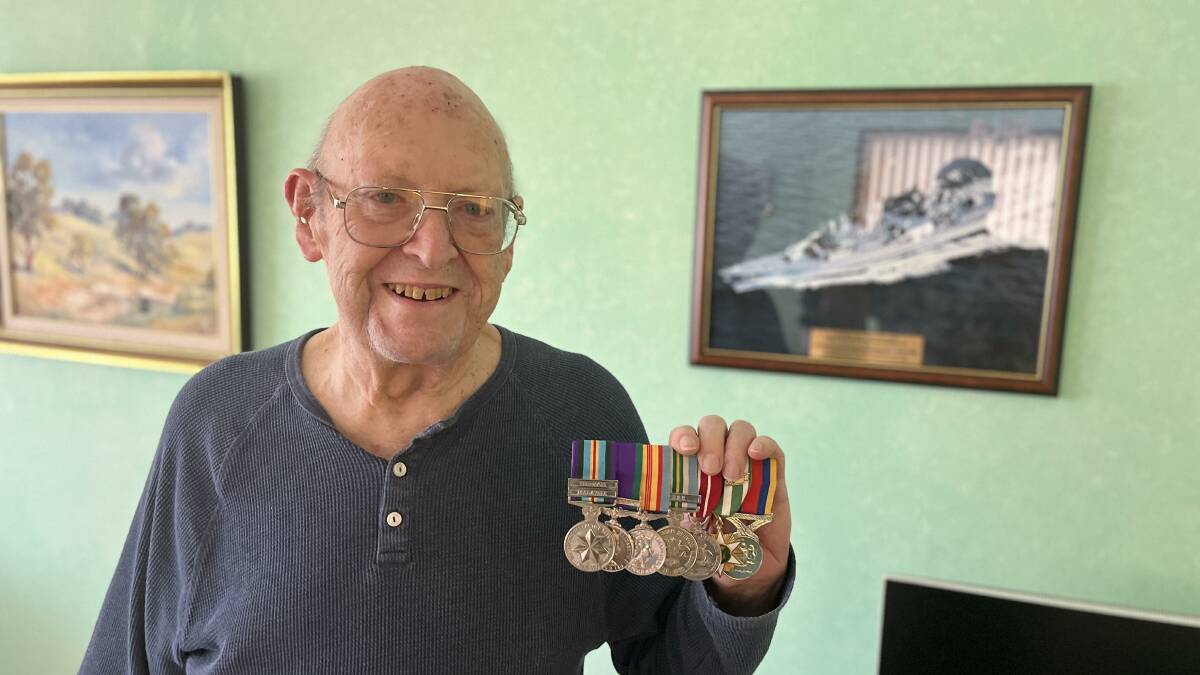 Royal Australian Navy veteran Darrell Hegarty holding the medals he received from his 12 years and 128 days of Naval service. Picture by James Parker