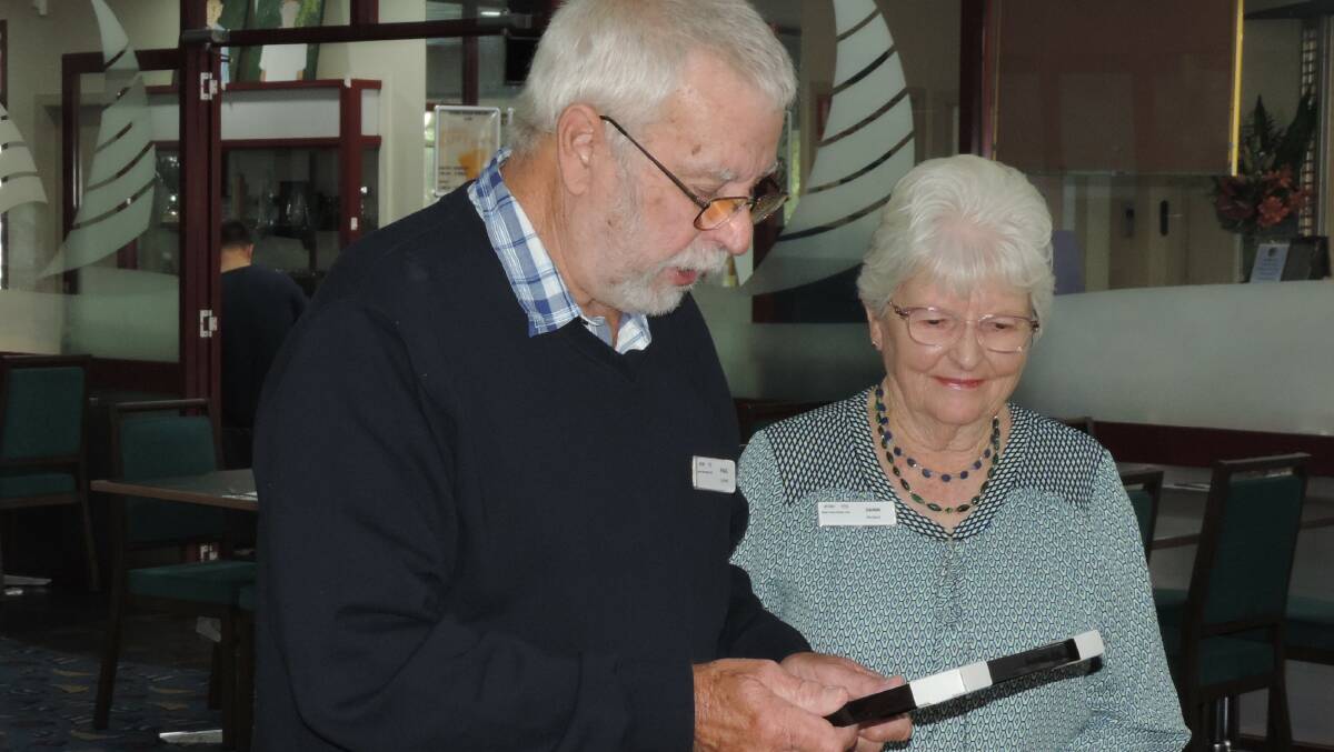Secretary of BVBC Paul Corbett presents Jann McNeil with life membership. Picture supplied